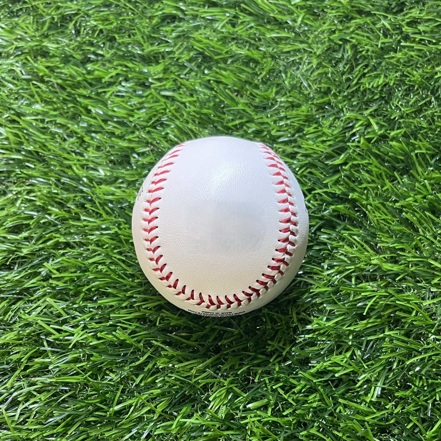 Blank Baseball Nonbranded Promotional Baseball on Grass Field