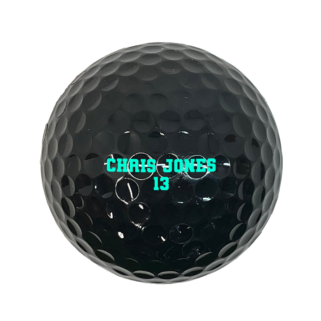 Customized Personalized Black Golf Ball 12 Pack Varsity Font in glow in the dark