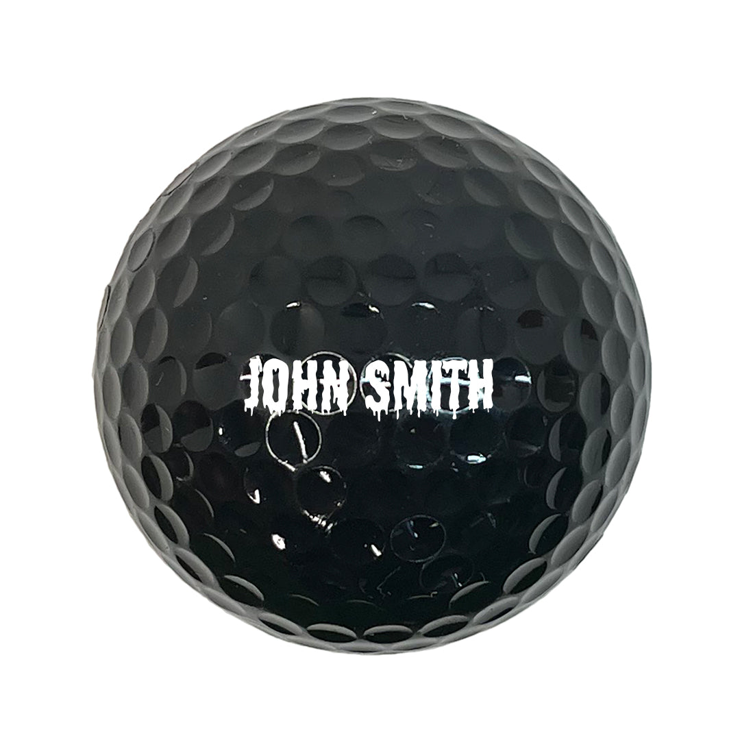 Customized Personalized Black Golf Ball 12 Pack Drip Font in White