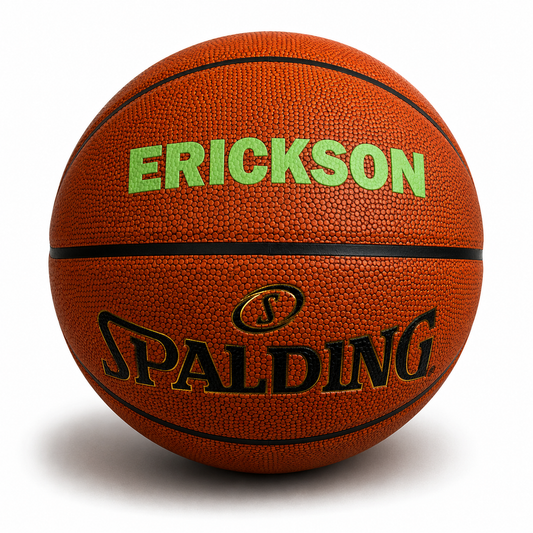 Customized Spalding TF500 Indoor Outdoor Game Ball with custom text printed on the top panel in bright green color.
