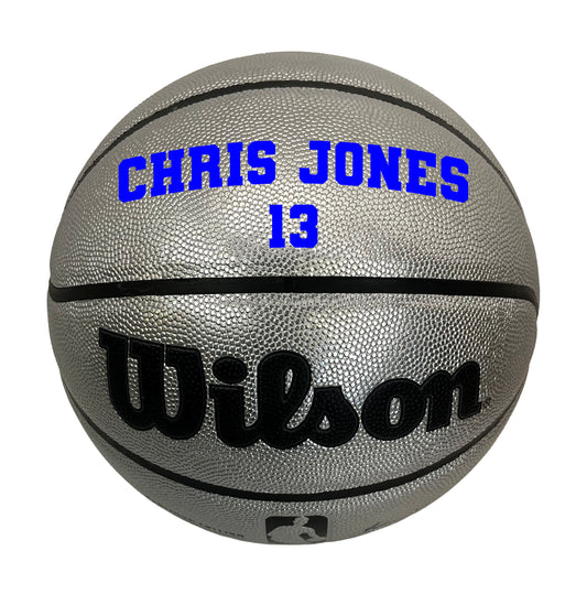 Customized Personalized Wilson Platinum Silver and Black Basketball in VARSITY TEAM FONT in color blue 2 lines text