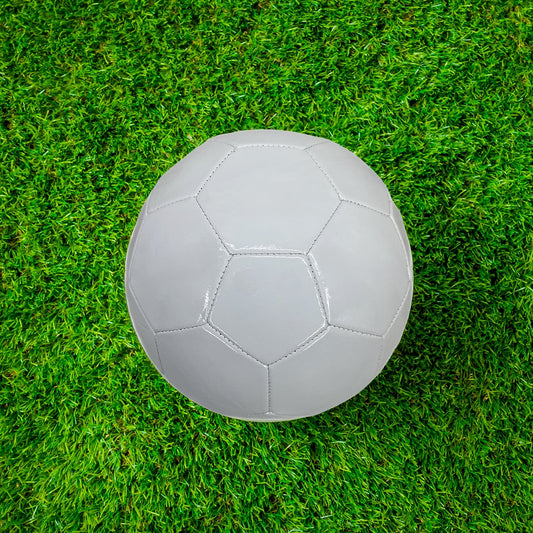 White Soccer Ball Blank Non Branded on Grass
