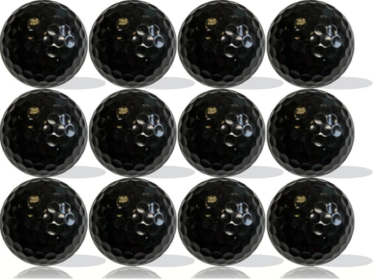 dozen black golf balls blank on a white background 