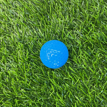 Non branded Blue golf ball blank on grass background