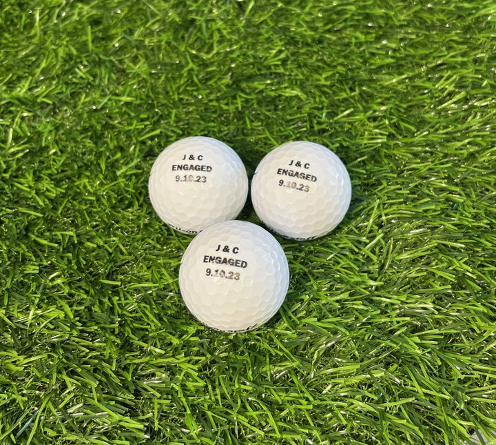 Customized Golf Balls with Black Text Three Balls