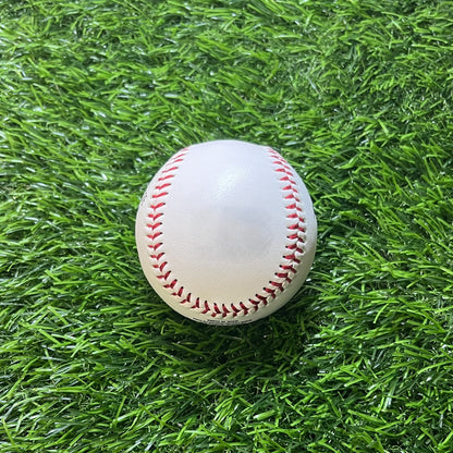 White Baseball on Grass