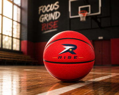 Lifestlye image of a Customized Red Outdoor Basketball, Rubber Ball with a custom logo printed on it.