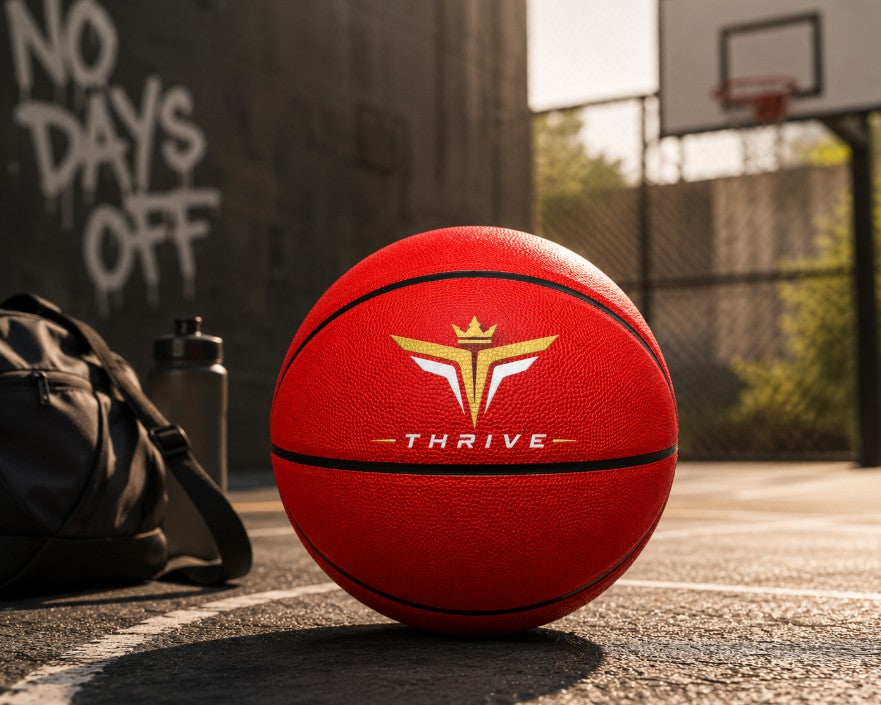 Lifestyle image of a Customized Red Outdoor Basketball, Rubber Ball with a custom logo printed on it.