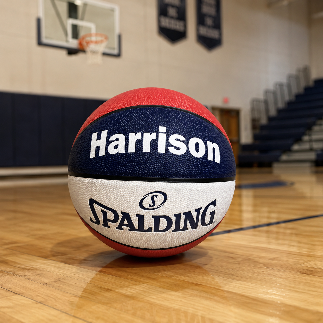 lifestyle image of a Customized Spalding Red White and Blue Indoor Outdoor TF250 Basketball
with custom text printed on the top panel.