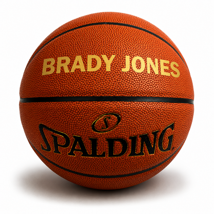 Customized Spalding TF500 Indoor Outdoor Game Ball with custom text written on the top panel.