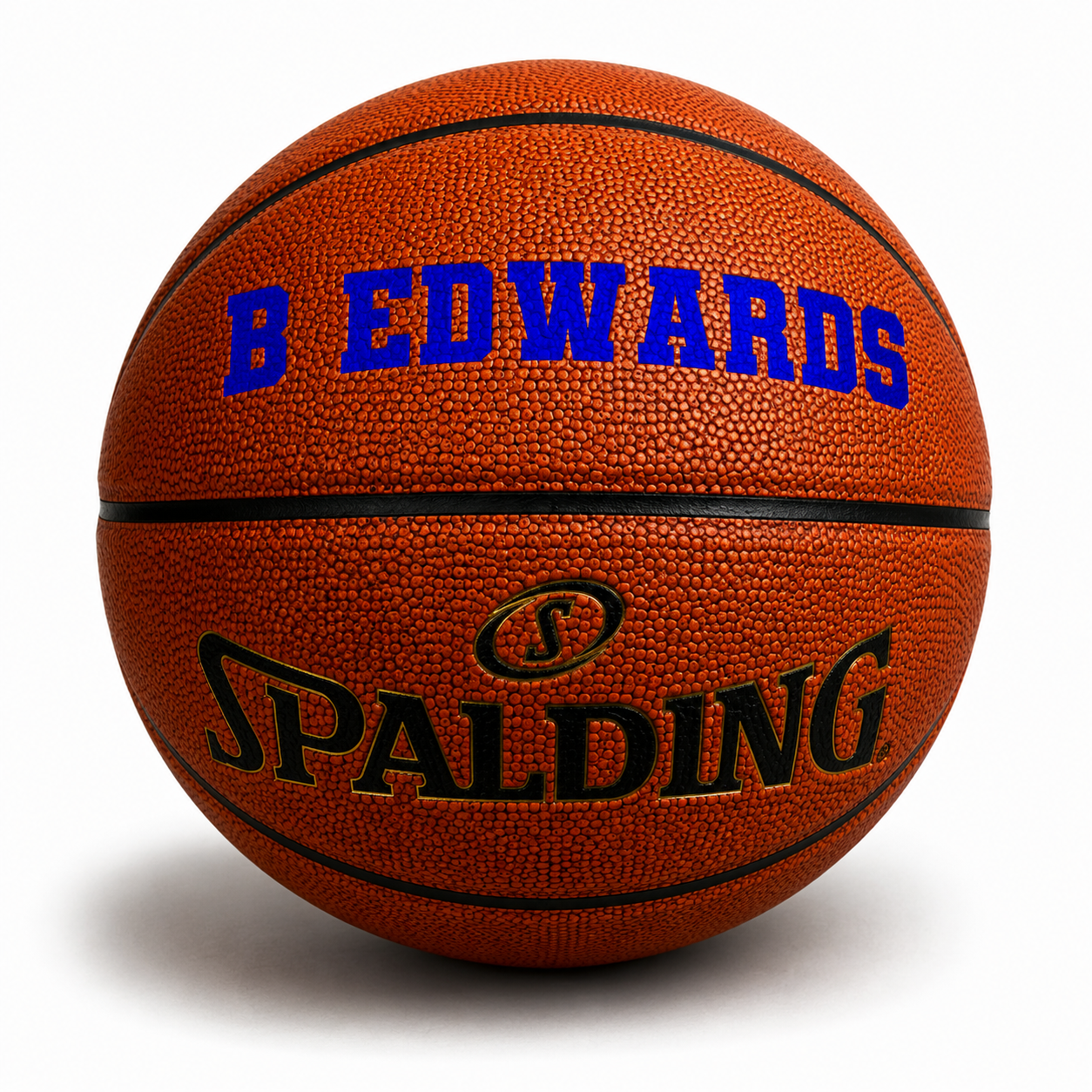 Customized Spalding TF500 Indoor Outdoor Game Ball with custom text written on the top panel in royal blue color.
