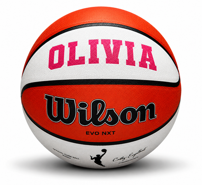 Customized WNBA Official Game Basketball with custom text written on the top panel in pink color.