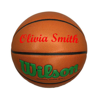 Customized Wilson Evolution Green Basketball with Red Text