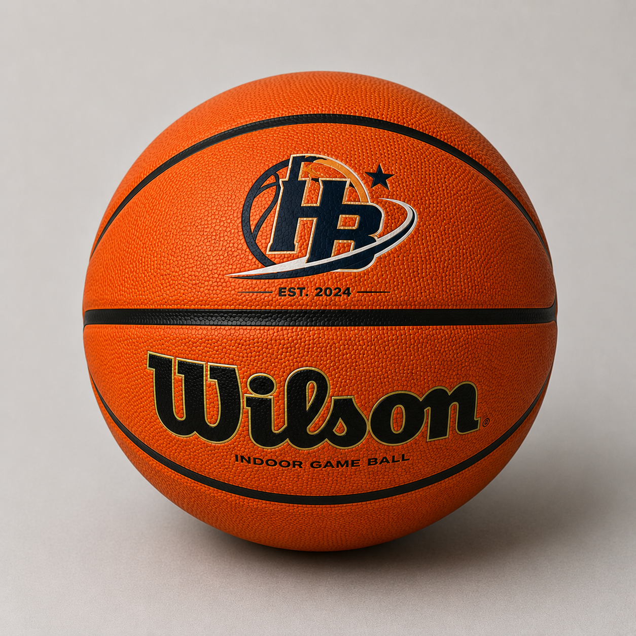 Customized Wilson NCAA EVO NXT Basketball Indoor with a custom logo on the top panel.