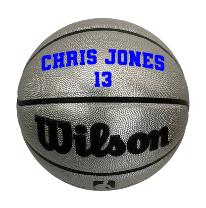 Customized Personalized Wilson Platinum Silver and Black Basketball in VARSITY TEAM FONT in color blue  2 lines text